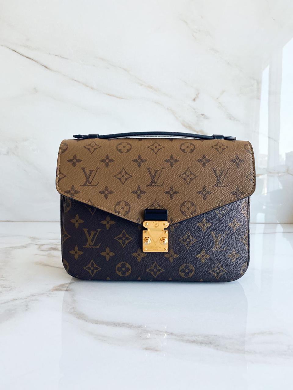 Bolsa Louis Vuitton Métis Pochette Monogram Reverse