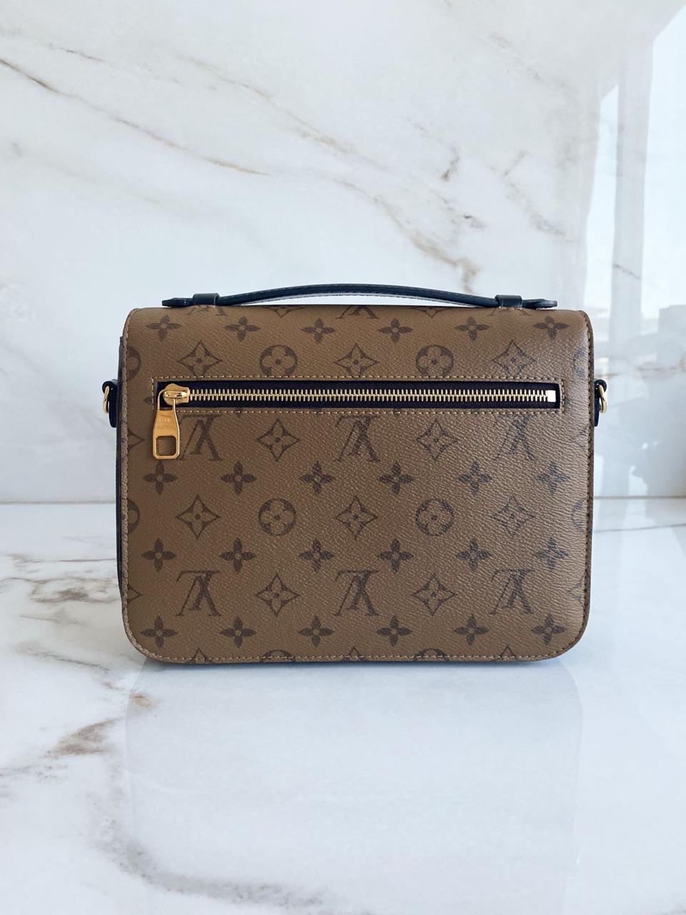 Bolsa Louis Vuitton Métis Pochette Monogram Reverse