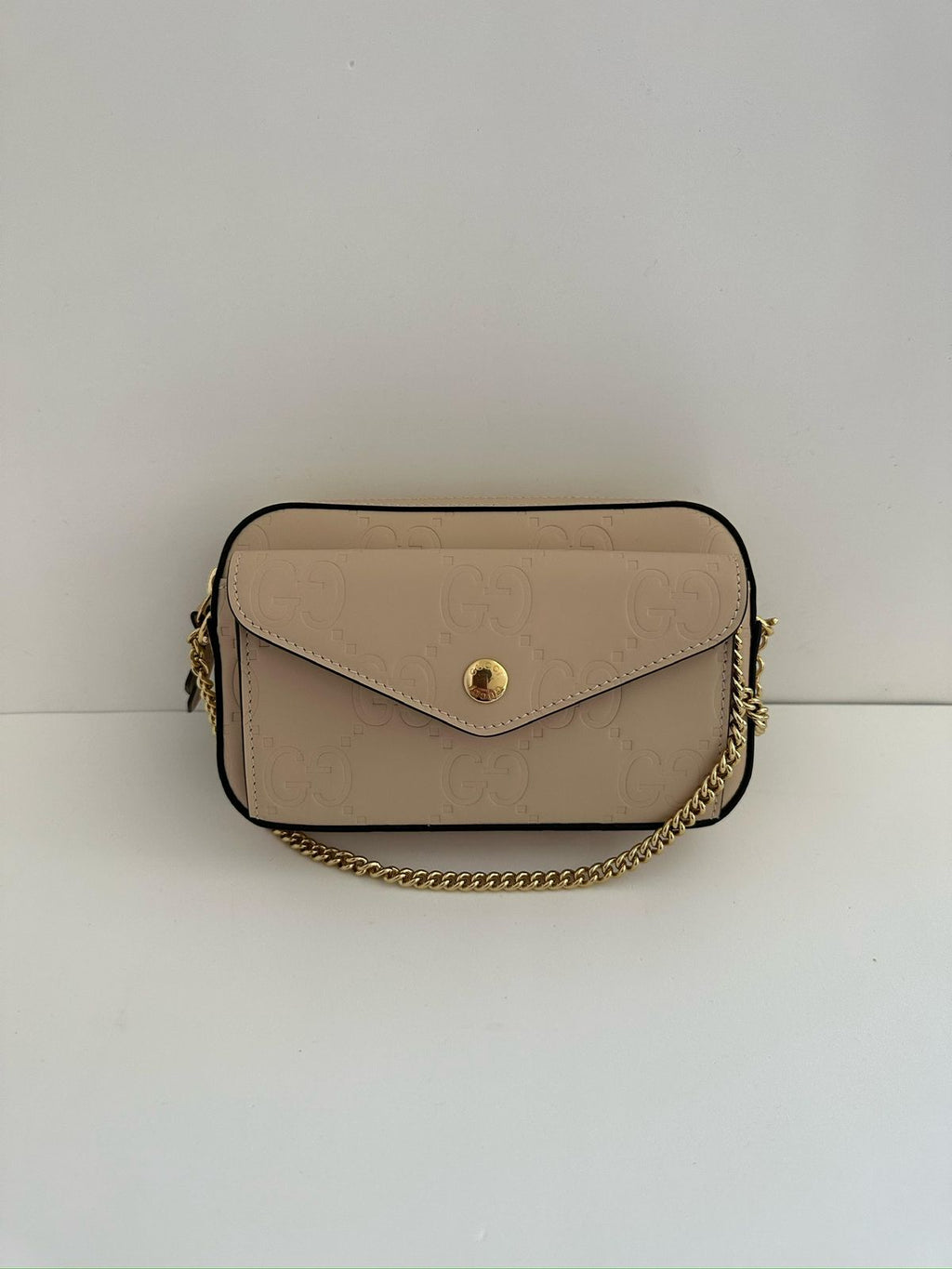 Bolsa Gucci GG Embossed Supermini Nude