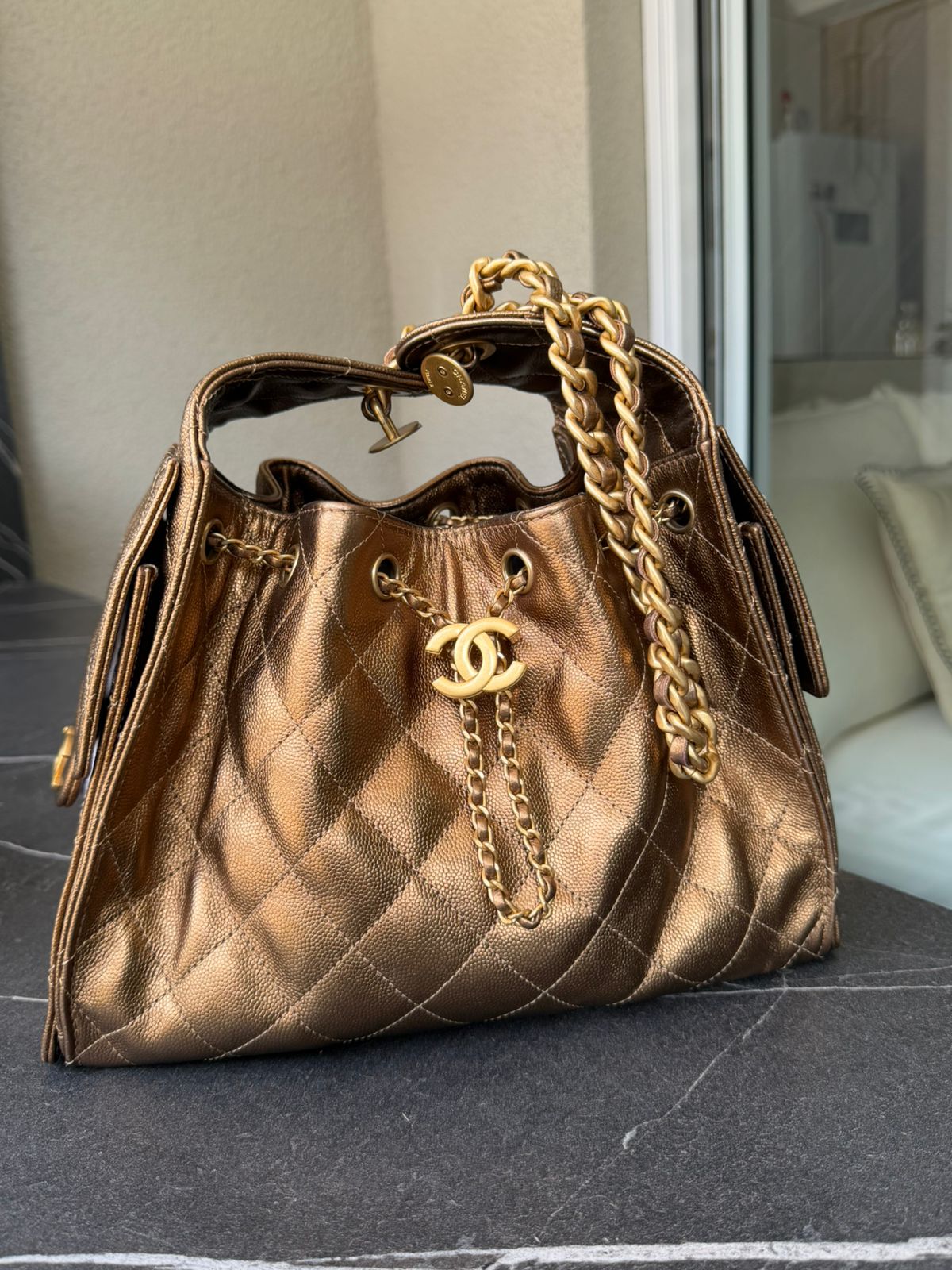 Bolsa Chanel 25, couro caviar, small, bronze