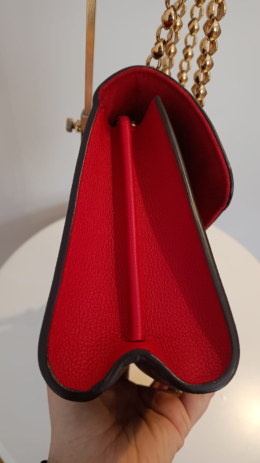 Bolsa Louis Vuitton Victorine Monograma e couro vermelho