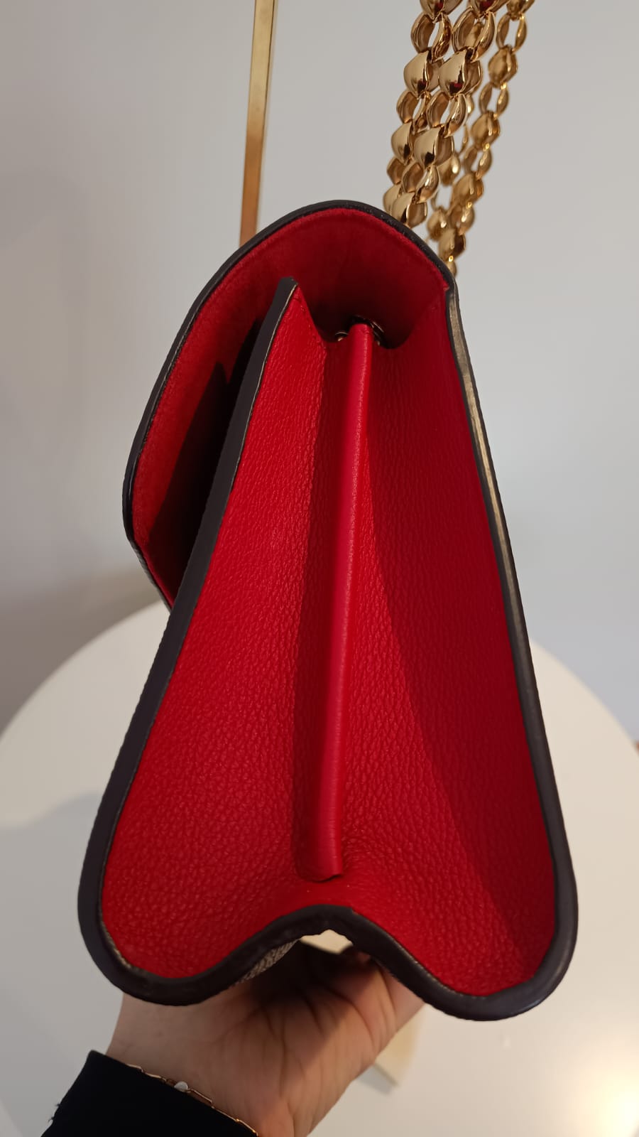 Bolsa Louis Vuitton Victorine Monograma e couro vermelho