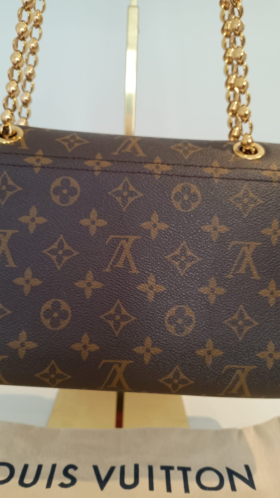 Bolsa Louis Vuitton Victorine Monograma e couro vermelho