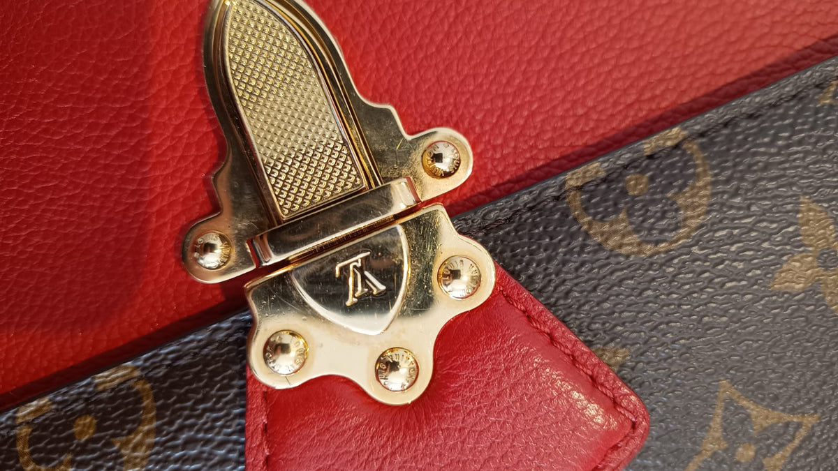 Bolsa Louis Vuitton Victorine Monograma e couro vermelho