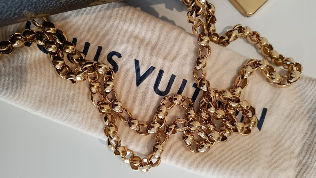 Bolsa Louis Vuitton Victorine Monograma e couro vermelho