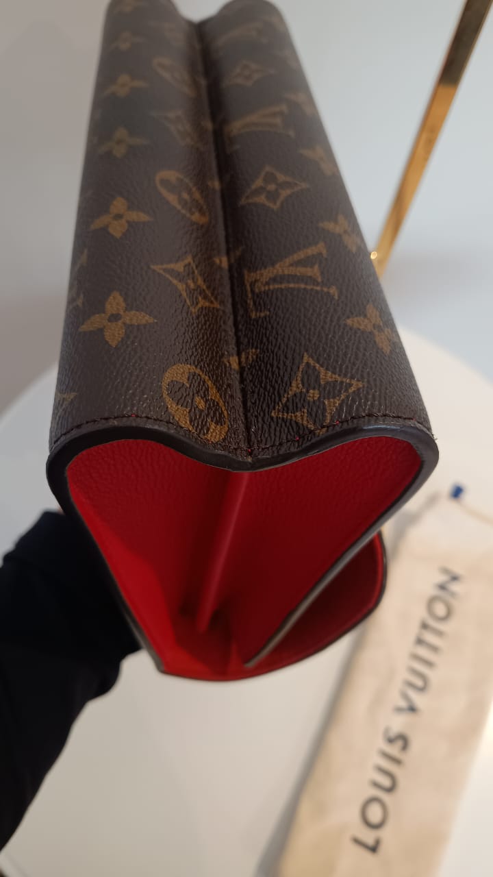 Bolsa Louis Vuitton Victorine Monograma e couro vermelho