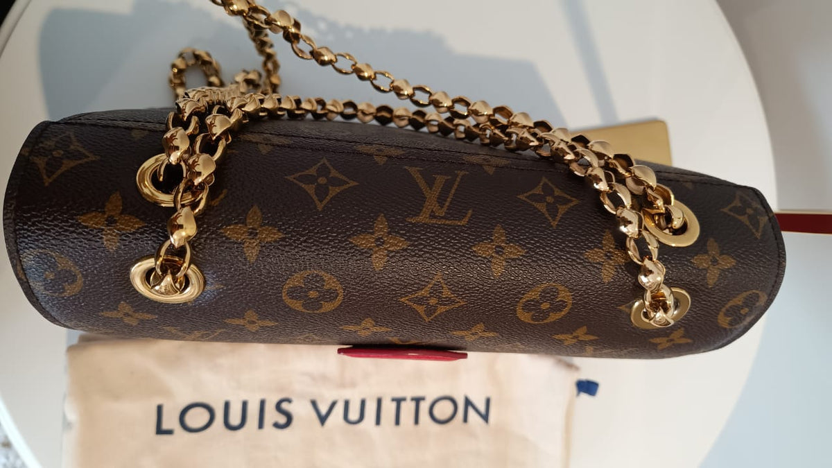 Bolsa Louis Vuitton Victorine Monograma e couro vermelho
