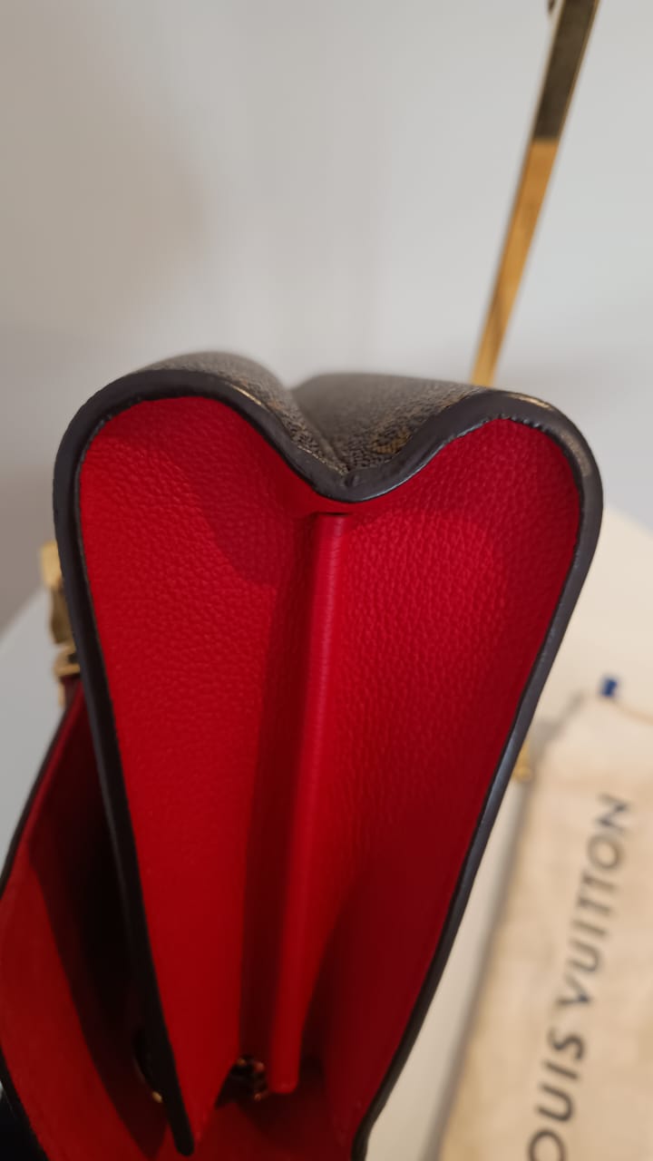 Bolsa Louis Vuitton Victorine Monograma e couro vermelho