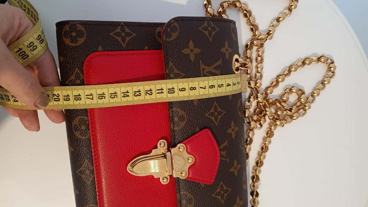 Bolsa Louis Vuitton Victorine Monograma e couro vermelho