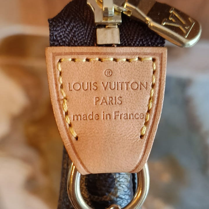 Bolsa Louis Vuitton Pochette Accessoires Mini