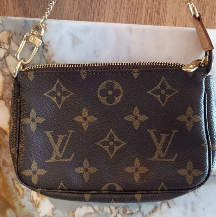 Bolsa Louis Vuitton Pochette Accessoires Mini