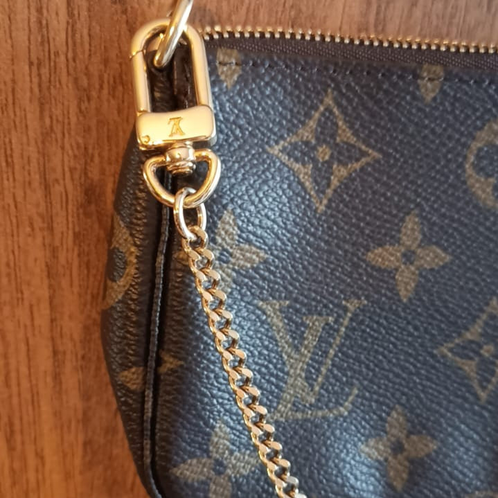 Bolsa Louis Vuitton Pochette Accessoires Mini
