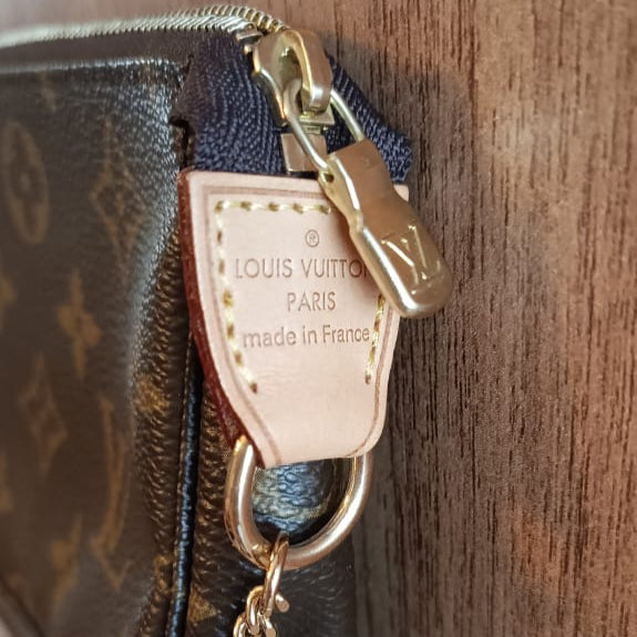 Bolsa Louis Vuitton Pochette Accessoires Mini