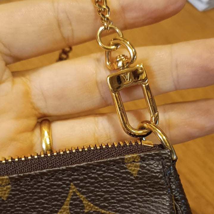 Bolsa Louis Vuitton Pochette Accessoires Mini