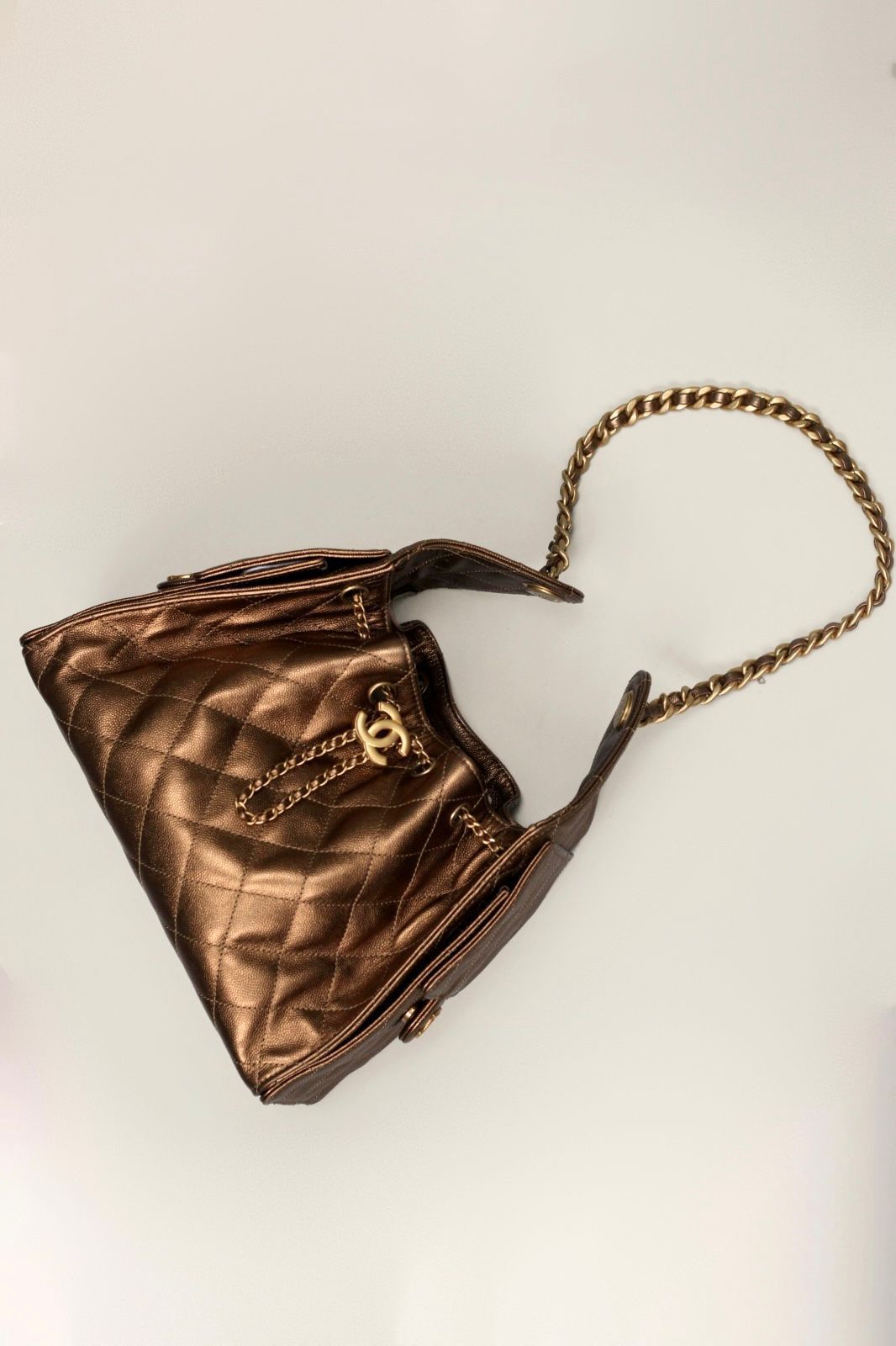 Bolsa Chanel 25, couro caviar, small, bronze