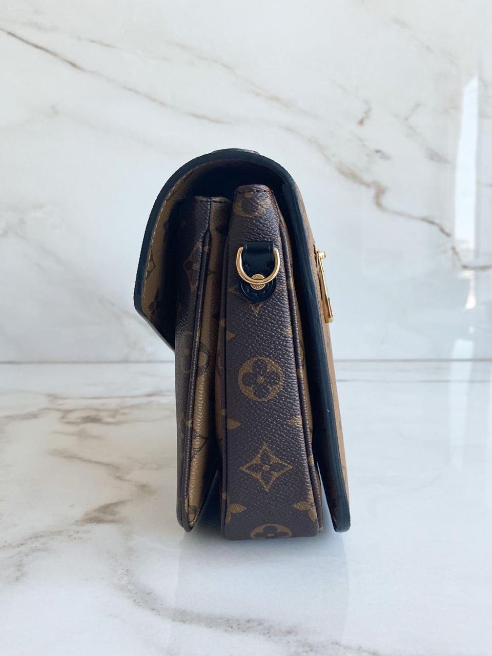 Bolsa Louis Vuitton Métis Pochette Monogram Reverse