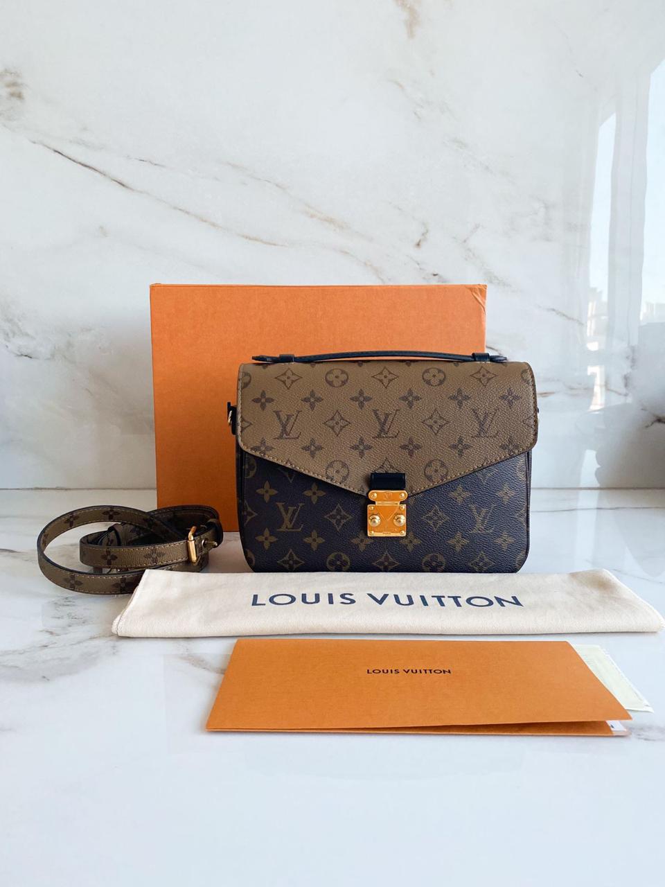 Bolsa Louis Vuitton Métis Pochette Monogram Reverse
