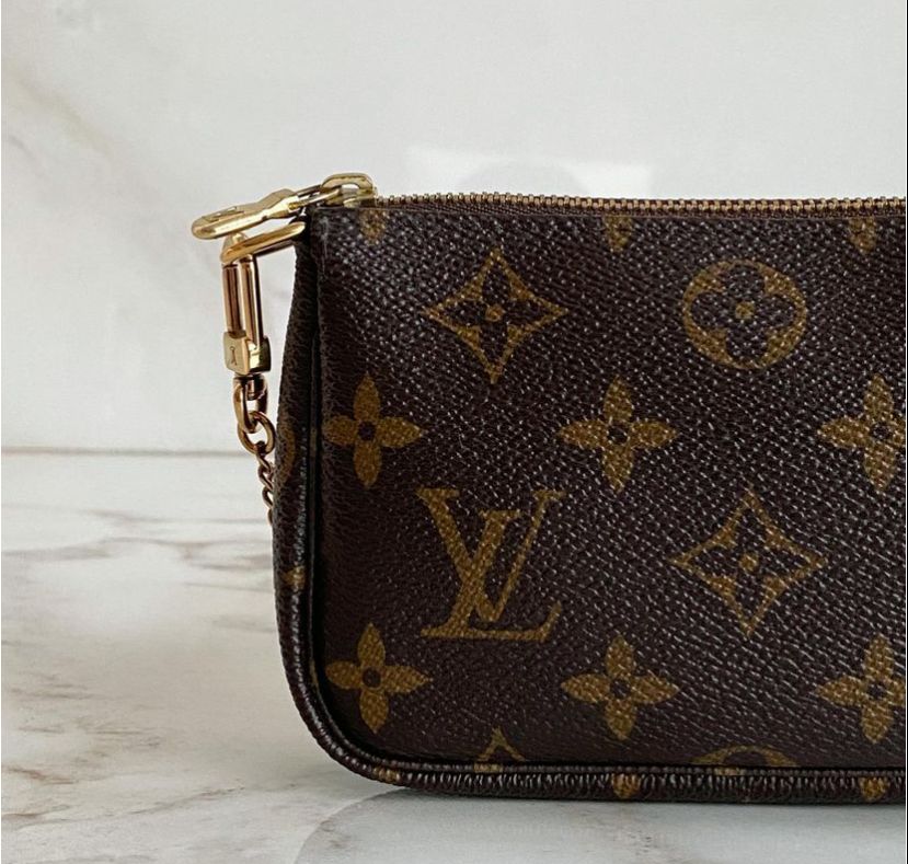 Bolsa Louis Vuitton Pochette Accessoires Mini